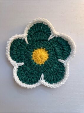 Crochet dark green flower coaster